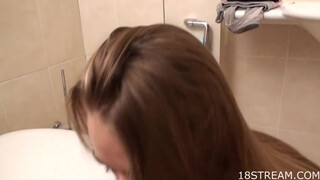 Naked skinny teen brushes her hair